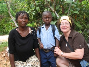 Crystal with her sponsored child Dieumile and his mother